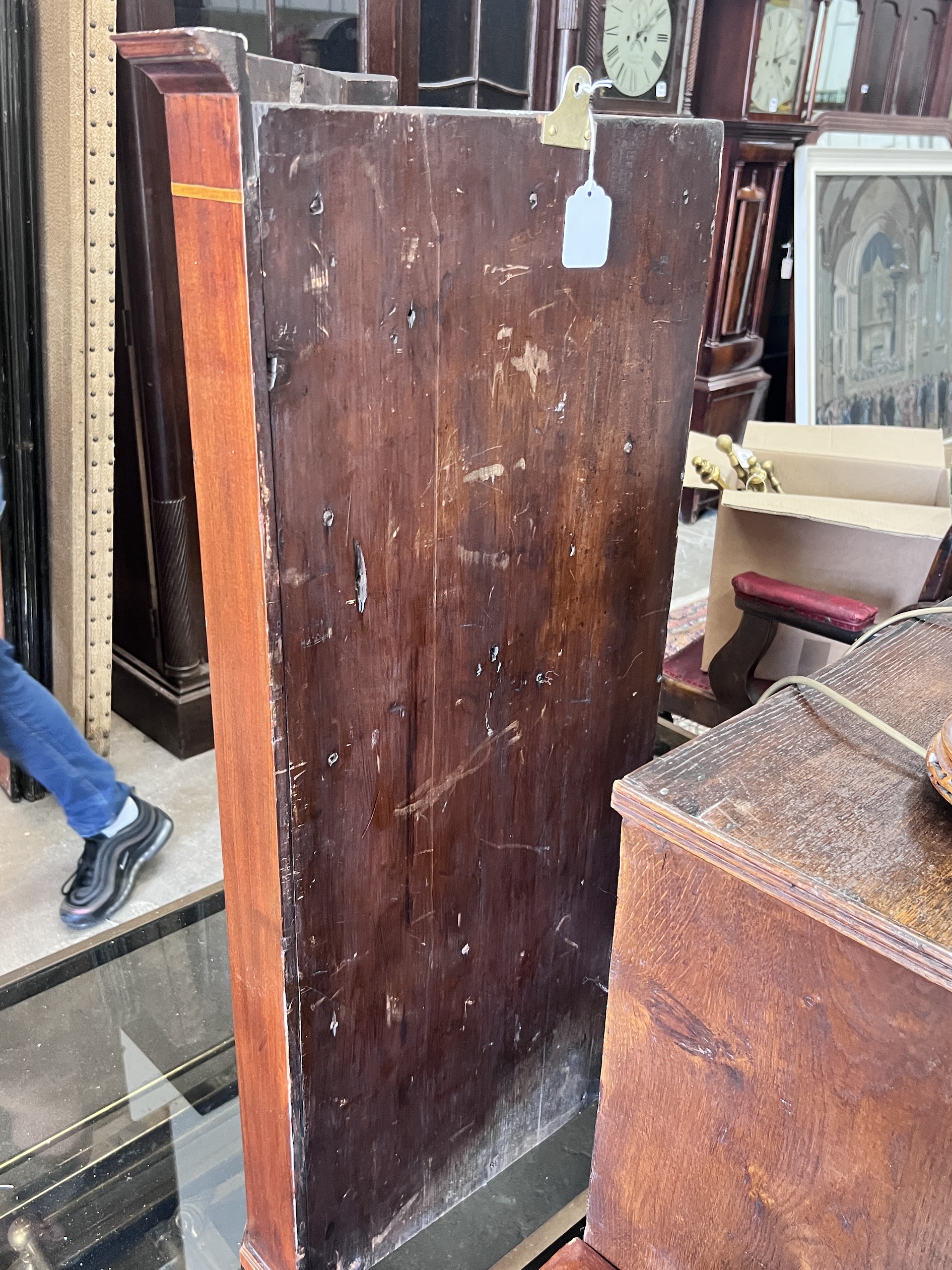 A George III inlaid mahogany hanging corner cupboard, width 64cm, depth 38cm, height 100cm